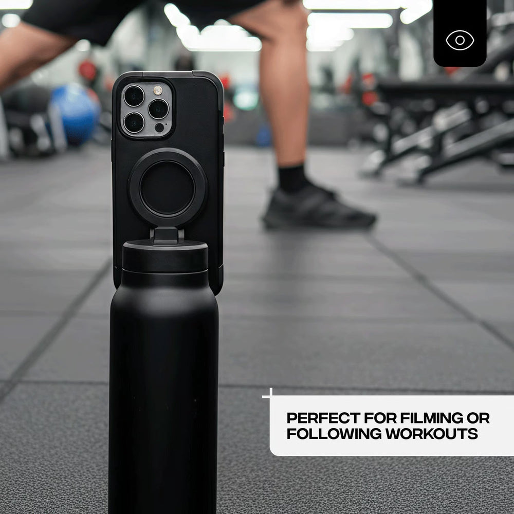 Black Footage Magna Bottle holding a phone to record training in a gym