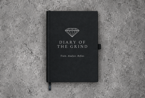 Black Diary of the Grind journal with silver diamond logo and Train. Analyse. Refine. cover lettering